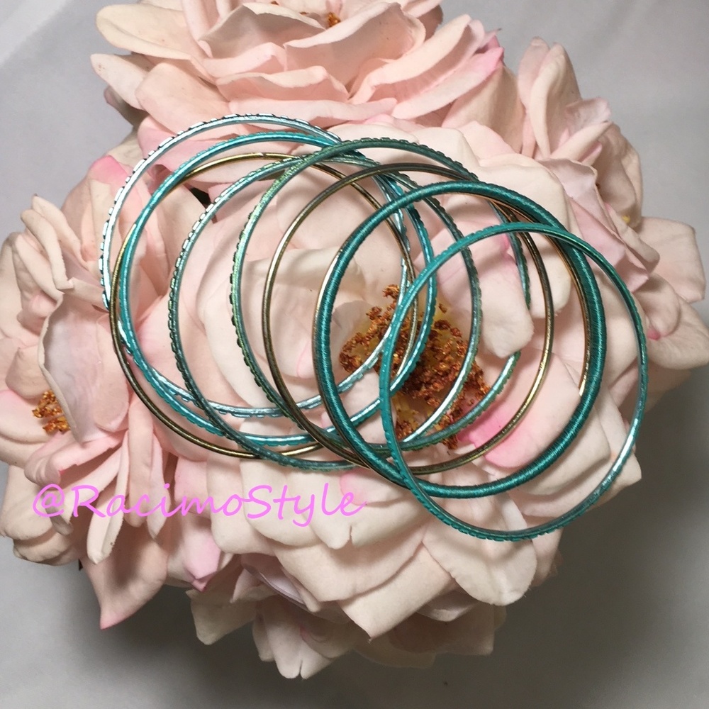 Set of 9 turquoise and gold colored bracelets